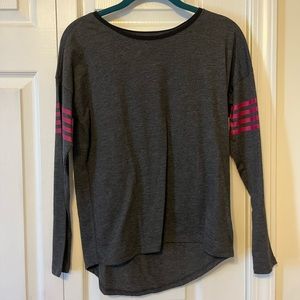 A SUPER SOFT BLACK WITH RED STRIPES ON THE SLEEVES. Size: XL girls